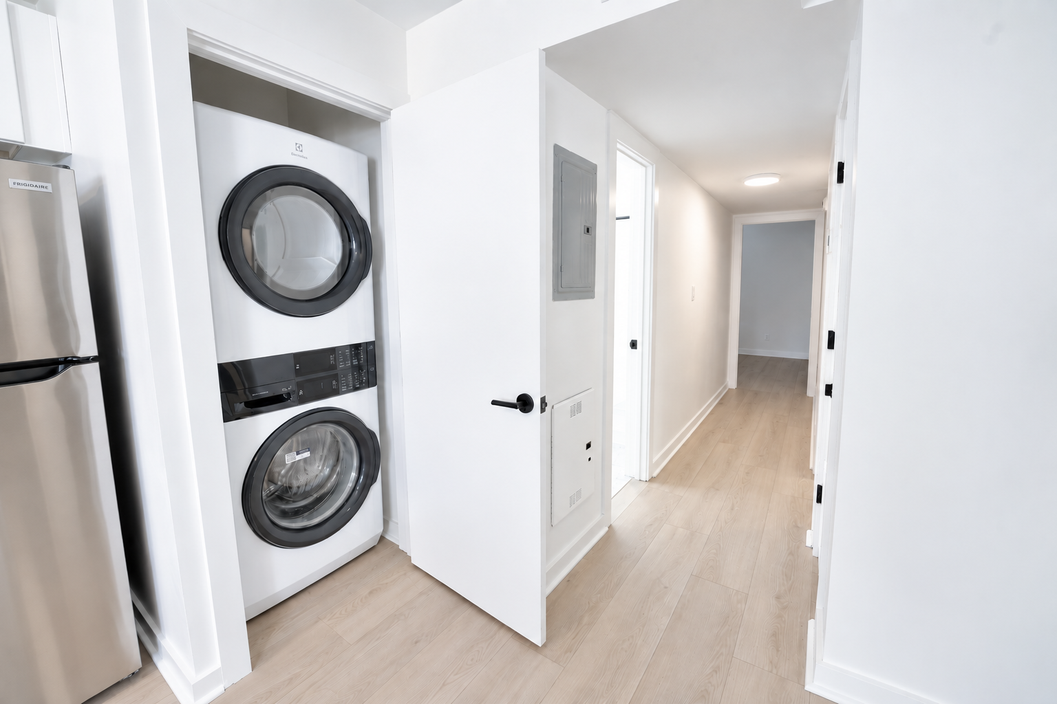 Bright Minimalist Hallway Laundry Nook