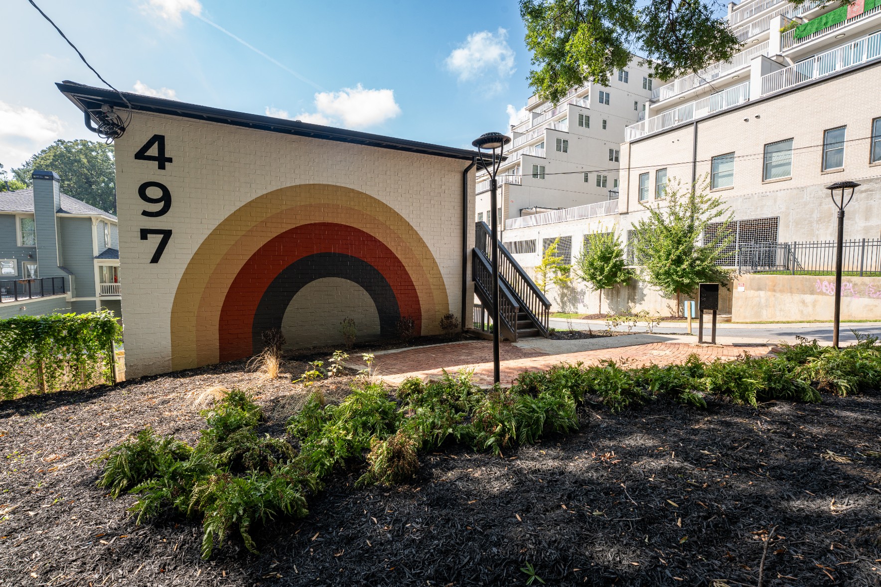 Mural detail on the side of 497 Boulevard Place apartments